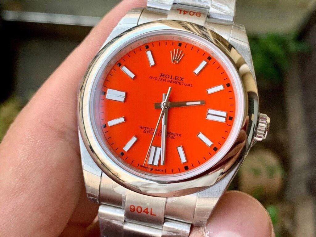 ĐỒNG HỒ ROLEX OYSTER PERPETUAL CƠ NAM DÂY KIM LOẠI MẶT MÀU ĐỎ EW FACTORY REP 1:1 CAO CẤP 41MM
