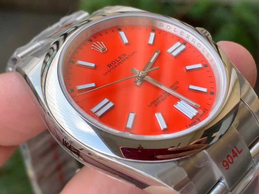 ĐỒNG HỒ ROLEX OYSTER PERPETUAL CƠ NAM DÂY KIM LOẠI MẶT MÀU ĐỎ EW FACTORY REP 1:1 CAO CẤP 41MM
