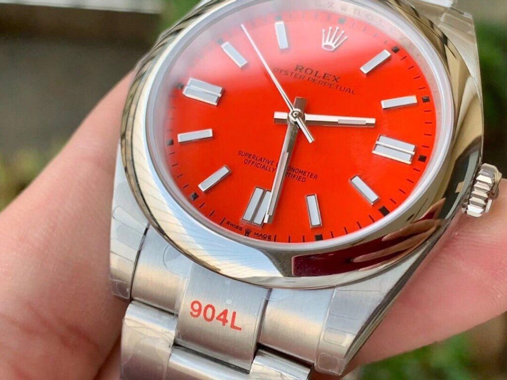 ĐỒNG HỒ ROLEX OYSTER PERPETUAL CƠ NAM DÂY KIM LOẠI MẶT MÀU ĐỎ EW FACTORY REP 1:1 CAO CẤP 41MM