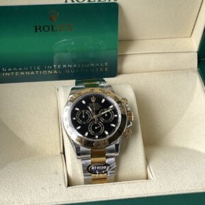 ĐỒNG HỒ NAM ROLEX DAYTONA REPLICA 1:1 MẶT SỐ ĐEN BEZEL VÀNG 40MM