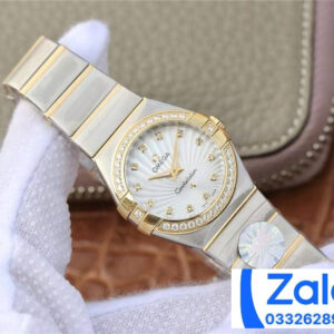 ĐỒNG HỒ NỮ OMEGA CONSTELLATION FAKE 1:1 NHÀ MÁY 3S NIỀNG VÀNG ĐÍNH ĐÁ 27MM