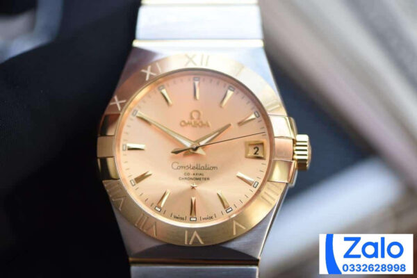 ĐỒNG HỒ NAM OMEGA CONSTELLATION FAKE 11 NHÀ MÁY VS MẶT VÀNG CHẢI TIA 38MM