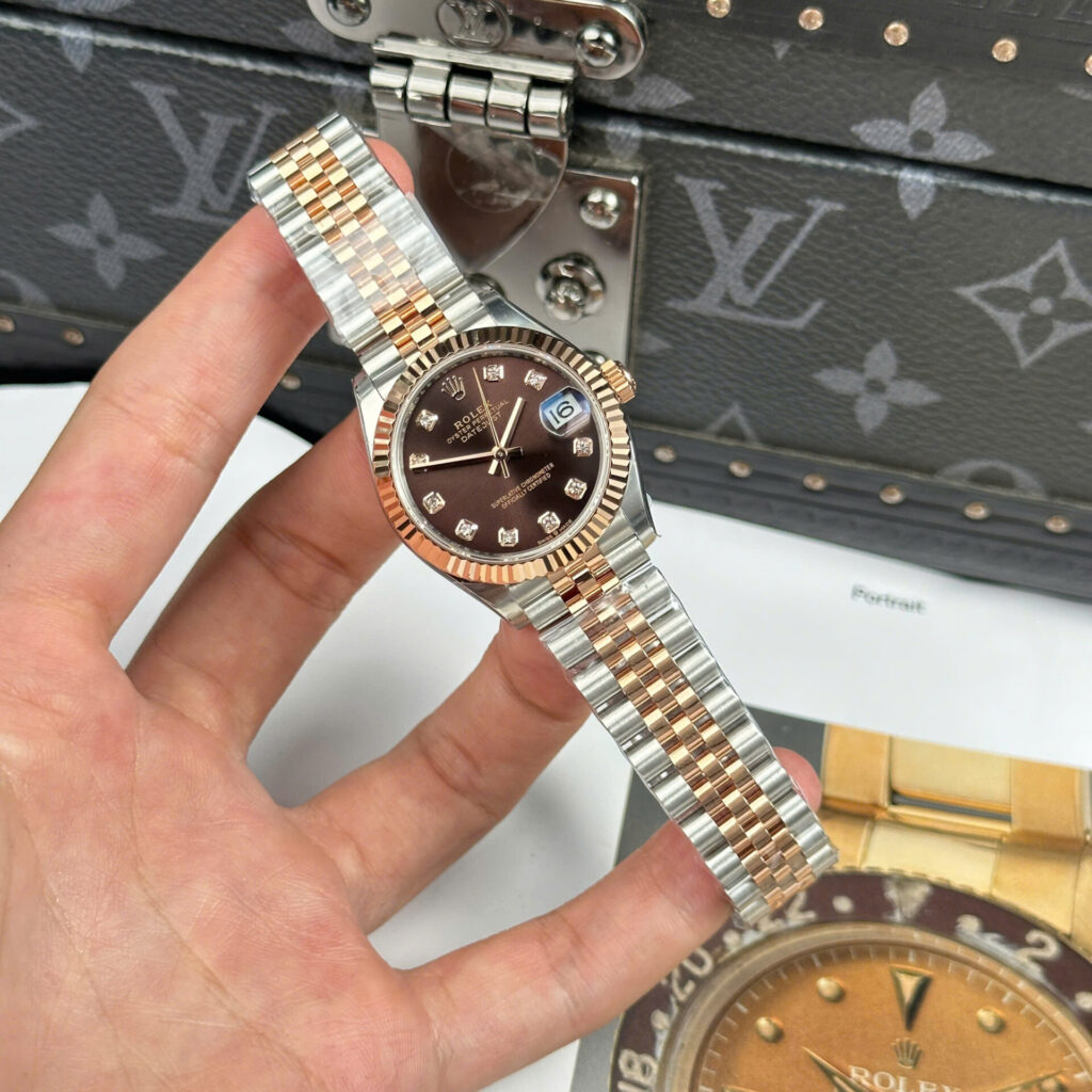 ĐỒNG HỒ ROLEX DATEJUST NỮ MẶT CHOCOLATE CỌC SỐ ĐÍNH ĐÁ NHÀ MÁY THB 31MM (1)