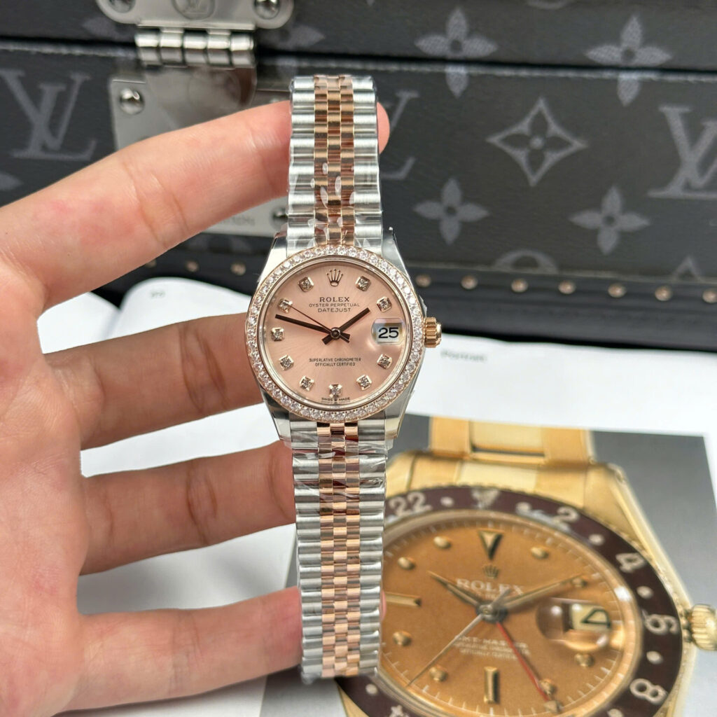 ĐỒNG HỒ ROLEX DATEJUST NỮ REPLICA MẶT HỒNG VIỀN ĐÍNH ĐÁ NHÀ MÁY THB 31MM (1)